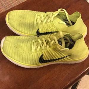 Mens Nike Flyknit Yellow sneakers. Size 10.5